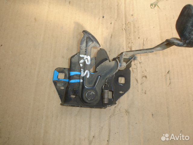 Замок капота Крайслер Вояджер Додж Караван 01-06г