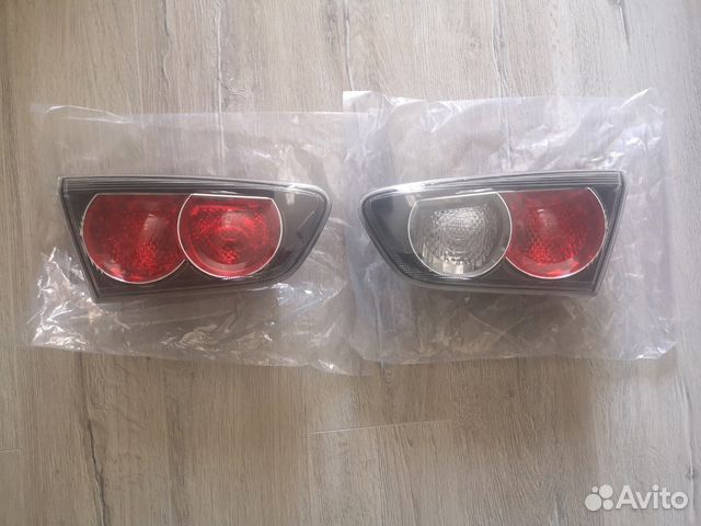 Задние фонари в крышку багажника на lancer 10 рест