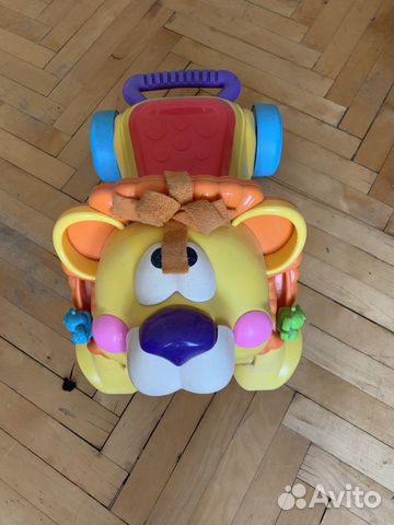Каталка лев fisher price