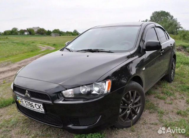 Mitsubishi lancer X решетка бампера