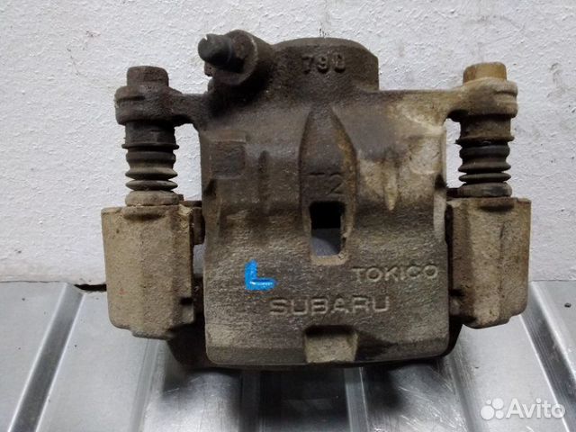 Суппорт задний задний левый Subaru Impreza