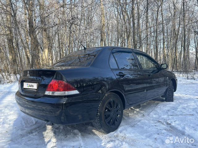 Mitsubishi Lancer 1.6 МТ, 2006, 90 000 км