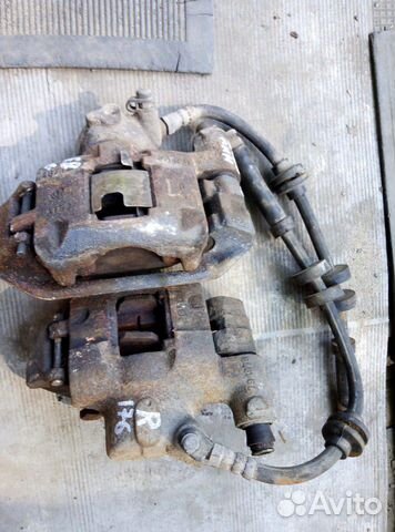 Суппорт тормозной передний Fiat Punto mk1 176 r13