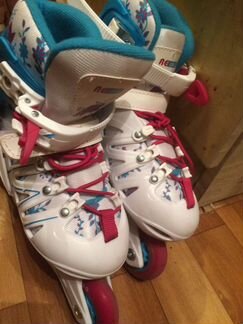 Роликовые коньки