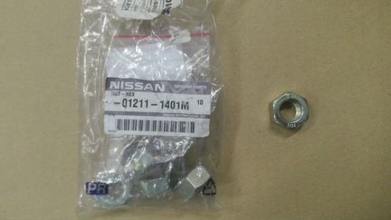 Гайка передних рычагов nissan cabstar 012111401M