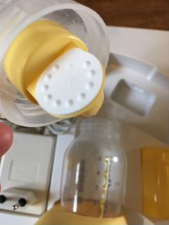 Молокоотсос Medela mini electric