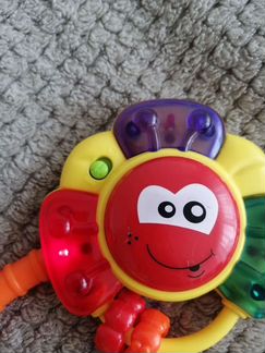 Игрушка на коляску